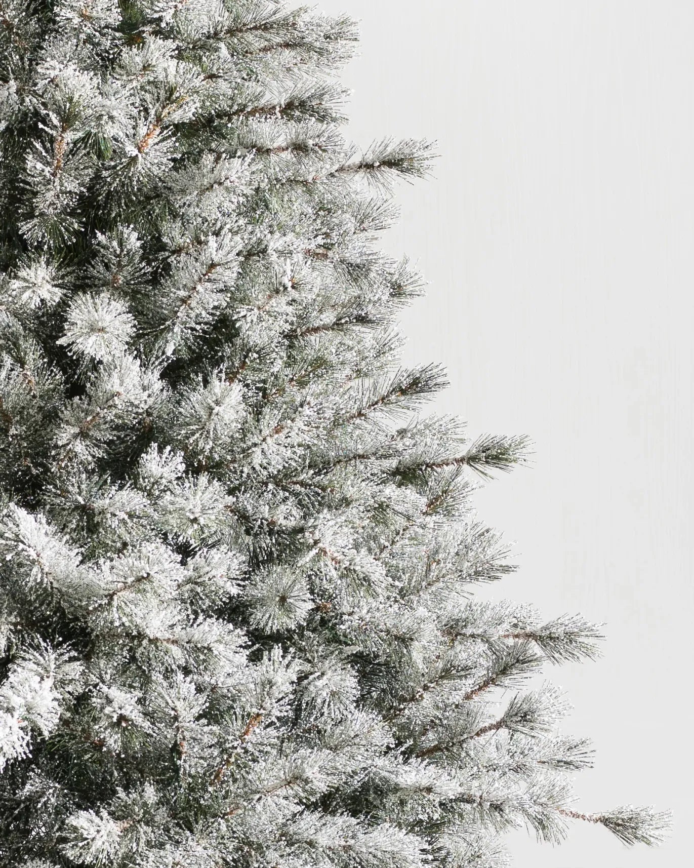 Sapins de Noël artificiels enneigés Alsaciens